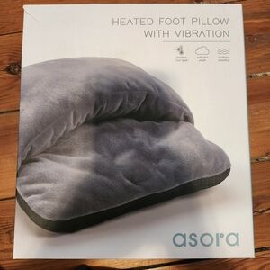 Heated foot pillow with vibration